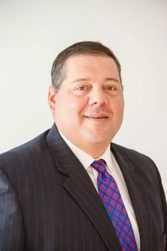 Thomas G Fallis